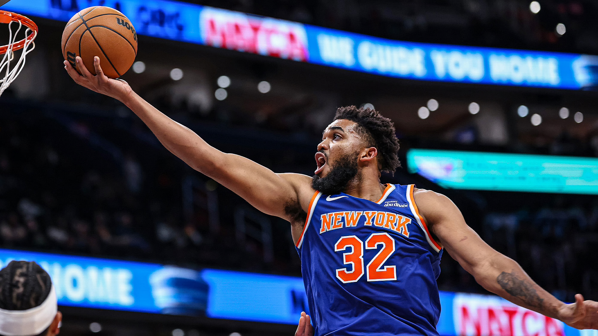 Karl Anthony Towns lays the ball up